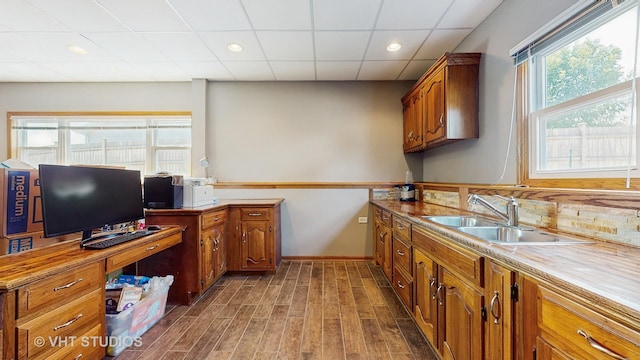 2220 Manico Dr, Crest Hill, IL 60403 - kitchen with brown cabinets, wood finished floors, a drop ceiling, recessed lighting, and decorative backsplash