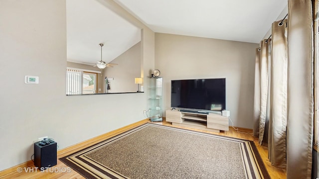 2220 Manico Dr, Crest Hill, IL 60403 - unfurnished living room featuring wood finished floors, a ceiling fan, and high vaulted ceiling