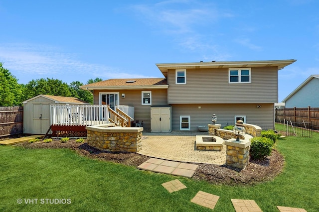 2220 Manico Dr, Crest Hill, IL 60403 - rear view of house with a storage unit, a wooden deck, and a patio area
