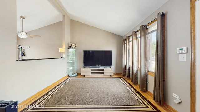 2220 Manico Dr, Crest Hill, IL 60403 - unfurnished living room with ceiling fan, wood finished floors, high vaulted ceiling, and beamed ceiling