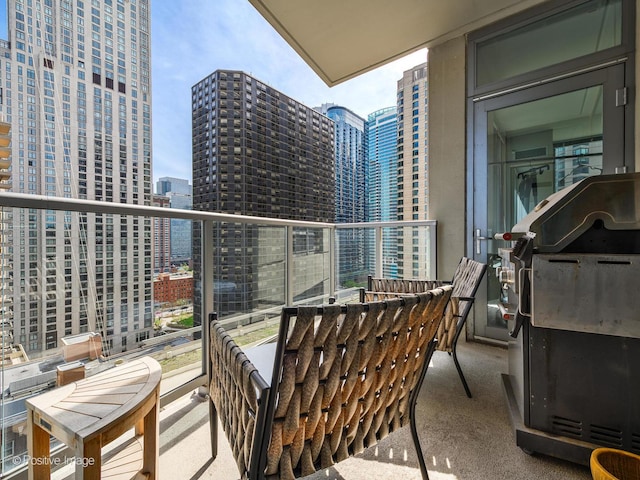 600 N Lake Shore Dr Unit 1802, Chicago, IL 60611 - balcony featuring a city view and a grill