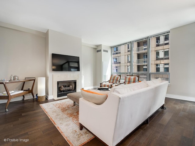 600 N Lake Shore Dr Unit 1802, Chicago, IL 60611 - living room with a fireplace, baseboards, and dark wood-type flooring