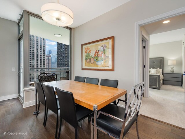 600 N Lake Shore Dr Unit 1802, Chicago, IL 60611 - dining room featuring a city view, baseboards, recessed lighting, and wood finished floors