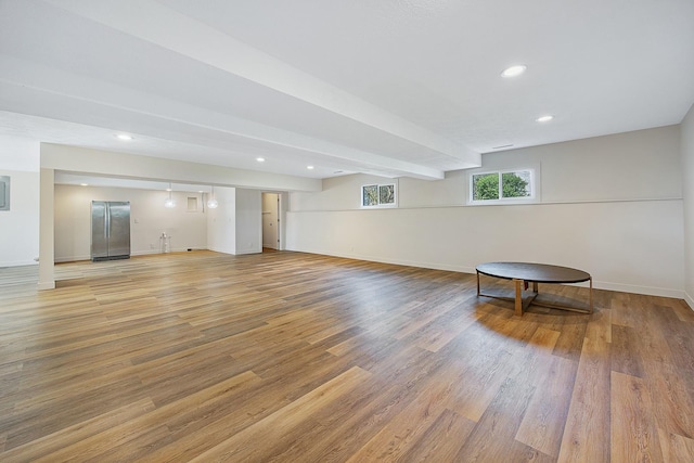 2104 Oakwood Ave, Bloomington, IL 61704 - basement featuring baseboards, recessed lighting, light wood-style floors, and freestanding refrigerator
