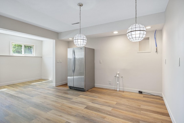 2104 Oakwood Ave, Bloomington, IL 61704 - unfurnished dining area featuring light wood-style floors, recessed lighting, visible vents, and baseboards