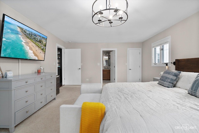 bedroom with a chandelier and light carpet