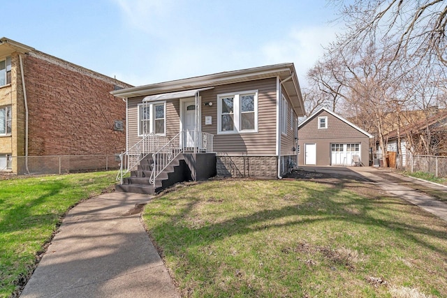 13916 S Dearborn St, Riverdale, IL 60827 - bungalow-style house featuring a front lawn and fence