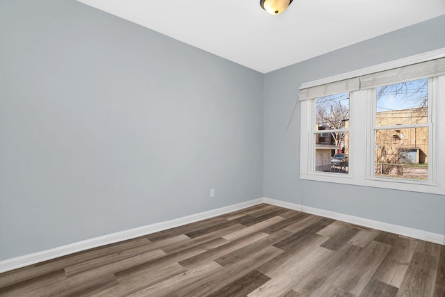 13916 S Dearborn St, Riverdale, IL 60827 - empty room featuring baseboards and wood finished floors
