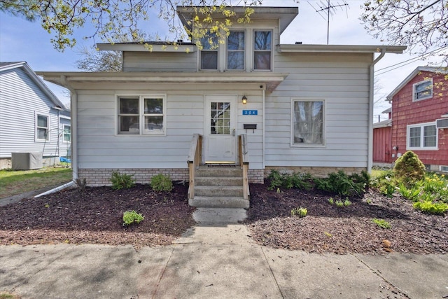 204 S Jackson Ave, Polo, IL 61064 - view of front of home featuring cooling unit and entry steps