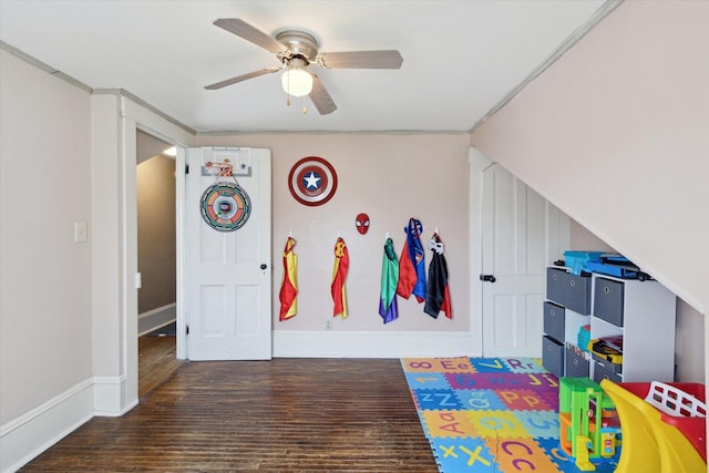 204 S Jackson Ave, Polo, IL 61064 - playroom featuring baseboards, wood finished floors, and a ceiling fan