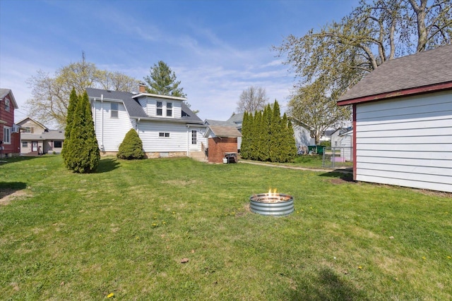 204 S Jackson Ave, Polo, IL 61064 - view of yard with an outdoor fire pit