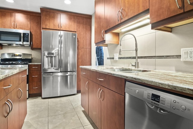 3104 Antelope Springs Rd, Northbrook, IL 60062 - kitchen featuring light stone countertops, recessed lighting, appliances with stainless steel finishes, and a sink