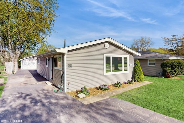 5743 Sherman Ave, Downers Grove, IL 60516 - view of front facade with an outdoor structure and a front yard