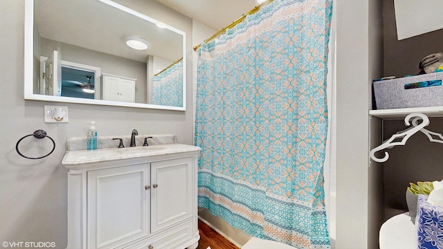 5743 Sherman Ave, Downers Grove, IL 60516 - full bathroom featuring a shower with curtain, wood finished floors, and vanity
