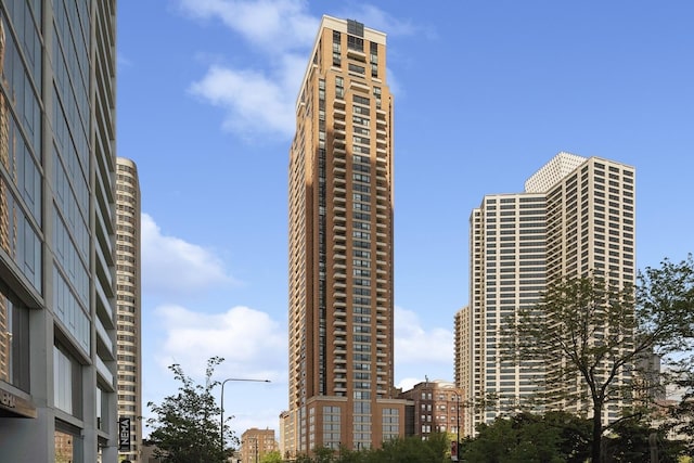 view of building exterior featuring a view of city