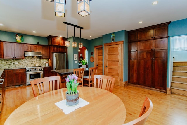 605 Ashland Ave, River Forest, IL 60305 - dining room featuring light wood-style flooring, recessed lighting, and stairs