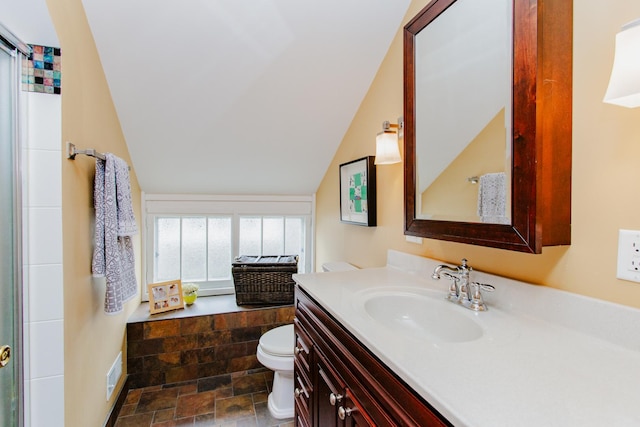 605 Ashland Ave, River Forest, IL 60305 - full bath featuring vanity, toilet, visible vents, stone finish floor, and vaulted ceiling