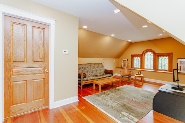 605 Ashland Ave, River Forest, IL 60305 - living area featuring vaulted ceiling, light wood-style flooring, and baseboards