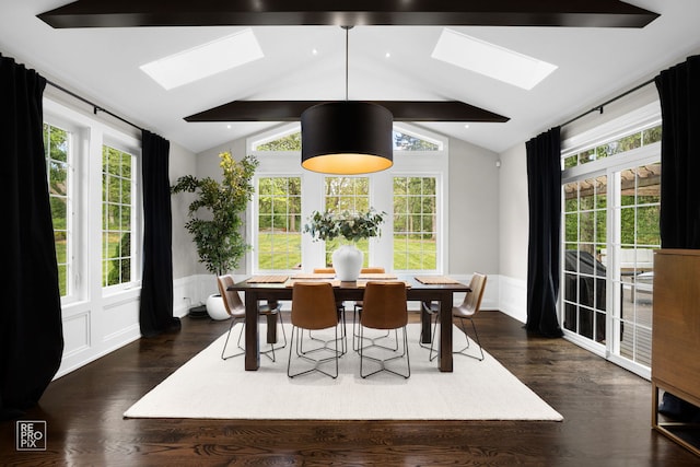 301 Canterbury Ln, Inverness, IL 60010 - dining space with a skylight, dark wood-type flooring, wainscoting, healthy amount of natural light, and a decorative wall