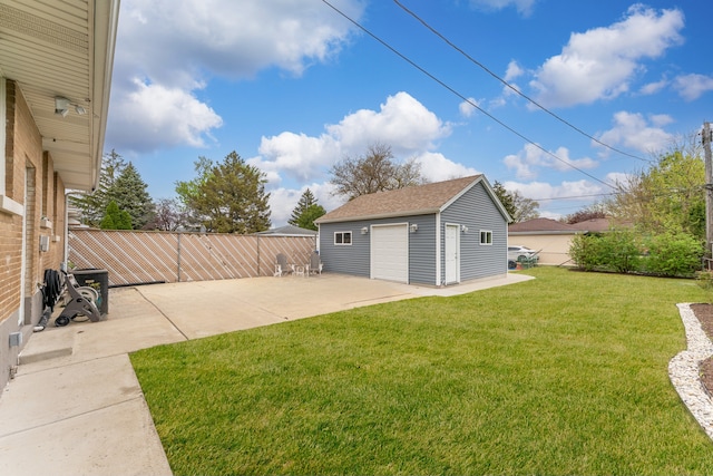 1213 N Irving Ave, Berkeley, IL 60163 - view of yard with a patio area, fence, a garage, and an outbuilding