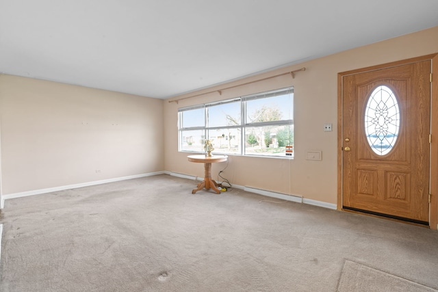 4620 Grace St, Schiller Park, IL 60176 - foyer entrance featuring plenty of natural light, baseboard heating, carpet flooring, and baseboards