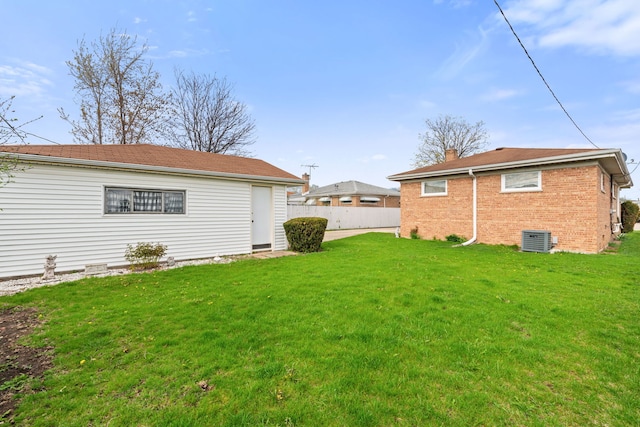 4620 Grace St, Schiller Park, IL 60176 - view of yard featuring central AC unit and fence