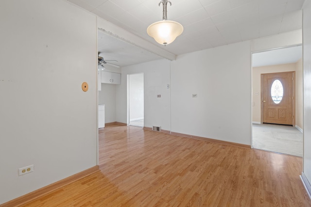 4620 Grace St, Schiller Park, IL 60176 - spare room with light wood-style floors, visible vents, a ceiling fan, and baseboards