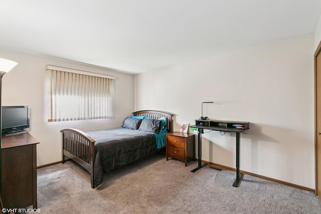 91 Frances Ln, Chicago Heights, IL 60411 - bedroom featuring baseboards and light carpet