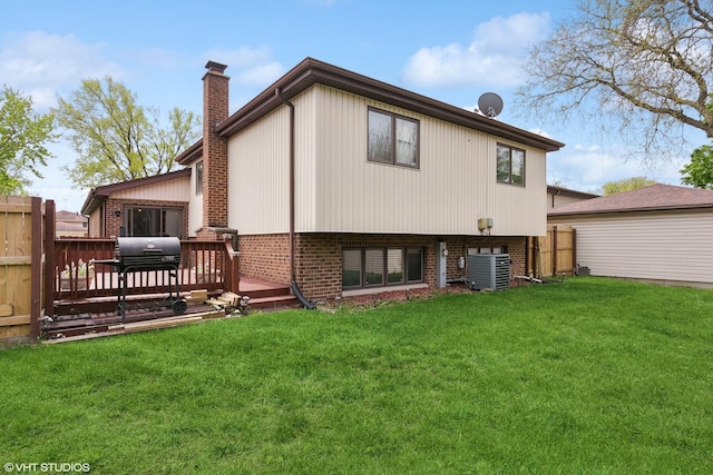 91 Frances Ln, Chicago Heights, IL 60411 - back of property with brick siding, a lawn, a chimney, and a deck