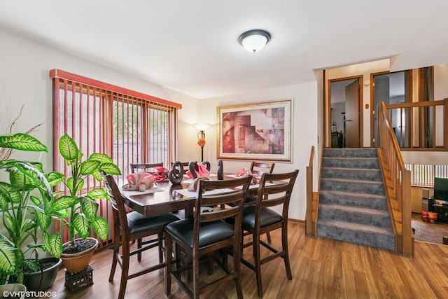 91 Frances Ln, Chicago Heights, IL 60411 - dining space with wood finished floors and stairway