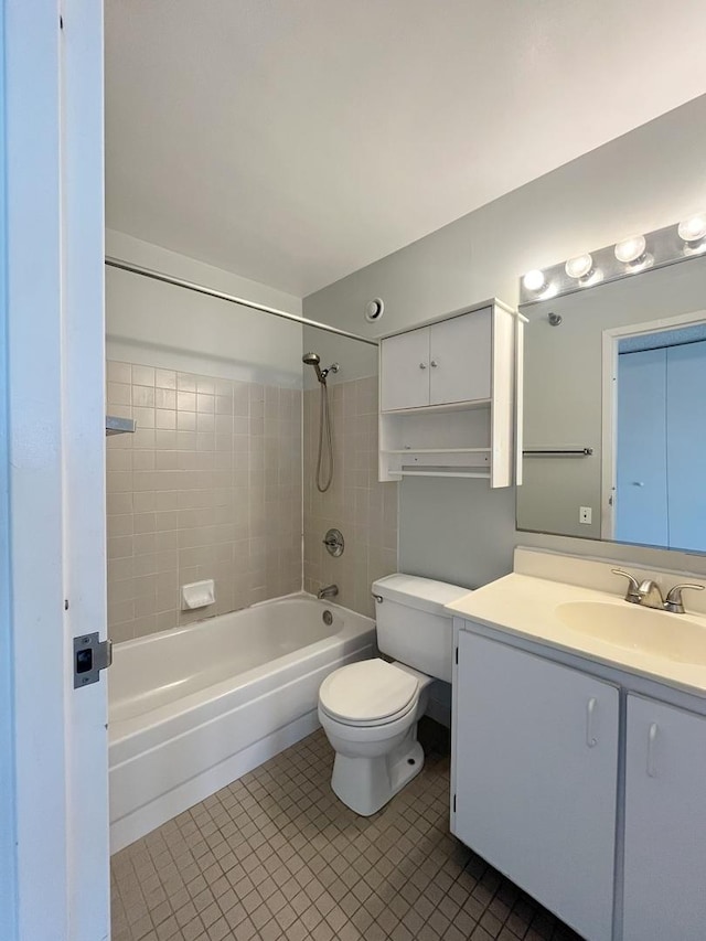 1122 N Clark St Unit 1702, Chicago, IL 60610 - full bath with shower / bath combination, toilet, vanity, and tile patterned flooring