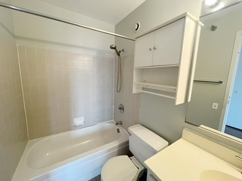 1122 N Clark St Unit 1702, Chicago, IL 60610 - bathroom featuring toilet,  shower combination, and vanity