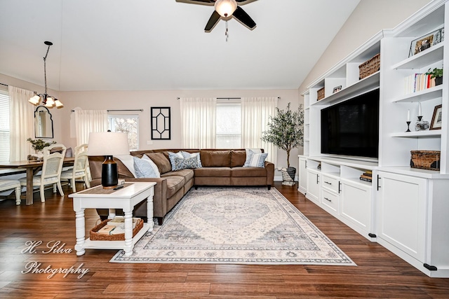 730 Goodfield Lndg, Elgin, IL 60124 - living room with dark wood-style flooring, ceiling fan with notable chandelier, and vaulted ceiling