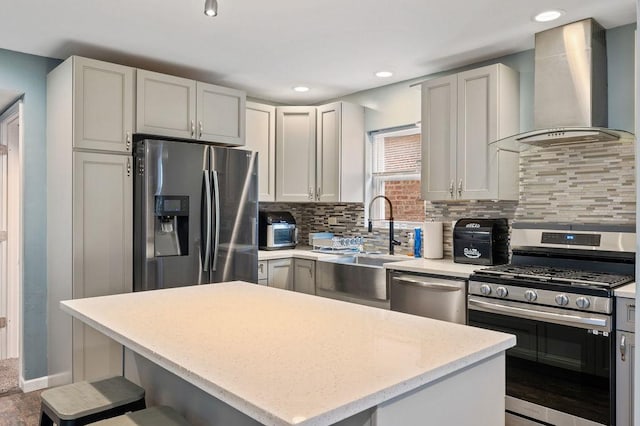 6522 S Kostner Ave, Chicago, IL 60629 - kitchen with wall chimney range hood, a kitchen island, decorative backsplash, a kitchen bar, and appliances with stainless steel finishes