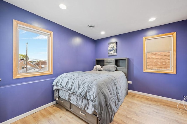 6522 S Kostner Ave, Chicago, IL 60629 - bedroom featuring recessed lighting, wood finished floors, and baseboards