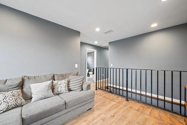 6522 S Kostner Ave, Chicago, IL 60629 - living area featuring wood finished floors, visible vents, and recessed lighting