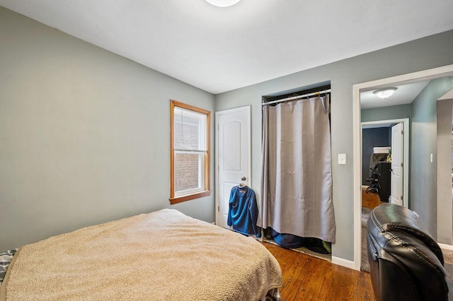6522 S Kostner Ave, Chicago, IL 60629 - bedroom featuring baseboards and dark wood-style floors