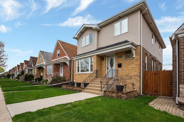 6522 S Kostner Ave, Chicago, IL 60629 - traditional-style house featuring a front lawn, brick siding, fence, and a residential view