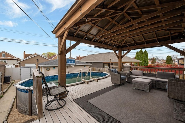 6522 S Kostner Ave, Chicago, IL 60629 - view of patio featuring a fenced in pool, fence, an outdoor hangout area, a wooden deck, and an outdoor structure