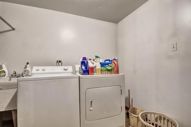 laundry area featuring laundry area and independent washer and dryer
