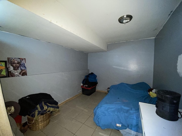 unfurnished bedroom featuring tile patterned floors