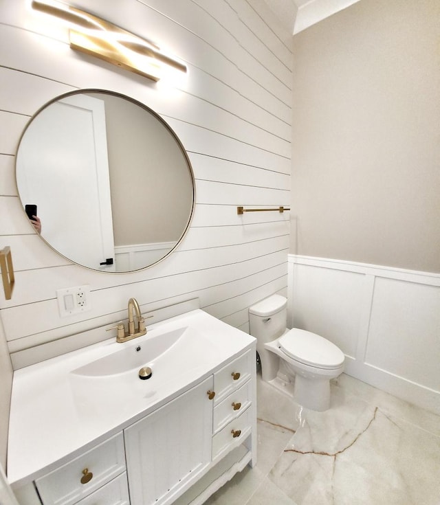 1911 S Prospect Ave, Park Ridge, IL 60068 - half bath with toilet, vanity, and wood walls