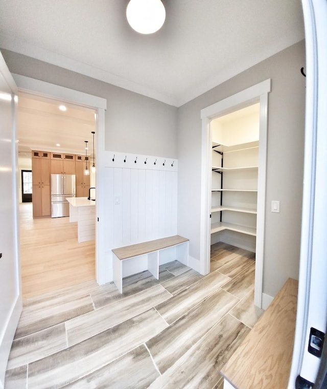 1911 S Prospect Ave, Park Ridge, IL 60068 - mudroom featuring light wood-type flooring and baseboards