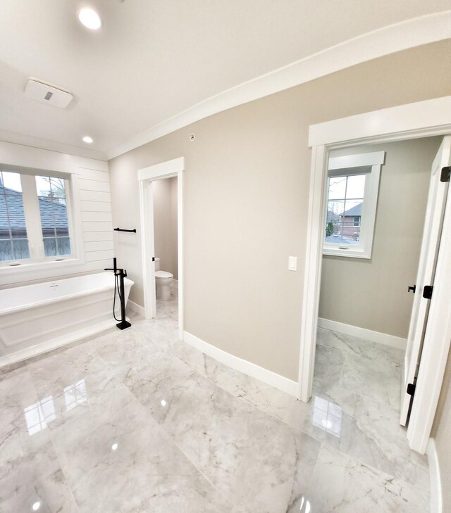 1911 S Prospect Ave, Park Ridge, IL 60068 - bathroom featuring toilet, baseboards, recessed lighting, a tub to relax in, and marble finish floor