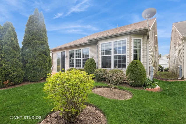 13474 Lehigh St, Huntley, IL 60142 - view of property exterior featuring a yard