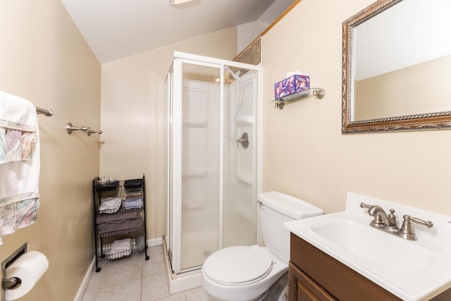bathroom featuring lofted ceiling, a stall shower, toilet, tile patterned flooring, and vanity