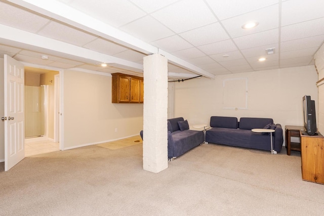 living area featuring light colored carpet, recessed lighting, and baseboards