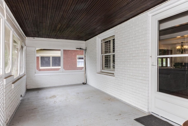unfurnished sunroom featuring healthy amount of natural light
