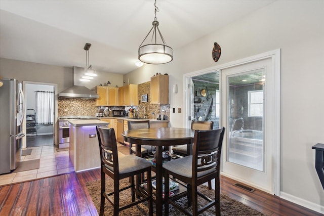 229 Stone Hollow Dr, Poplar Grove, IL 61065 - dining space with dark wood finished floors, visible vents, and baseboards
