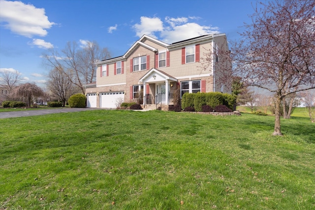 229 Stone Hollow Dr, Poplar Grove, IL 61065 - traditional-style house with a garage, aphalt driveway, roof mounted solar panels, a front yard, and brick siding
